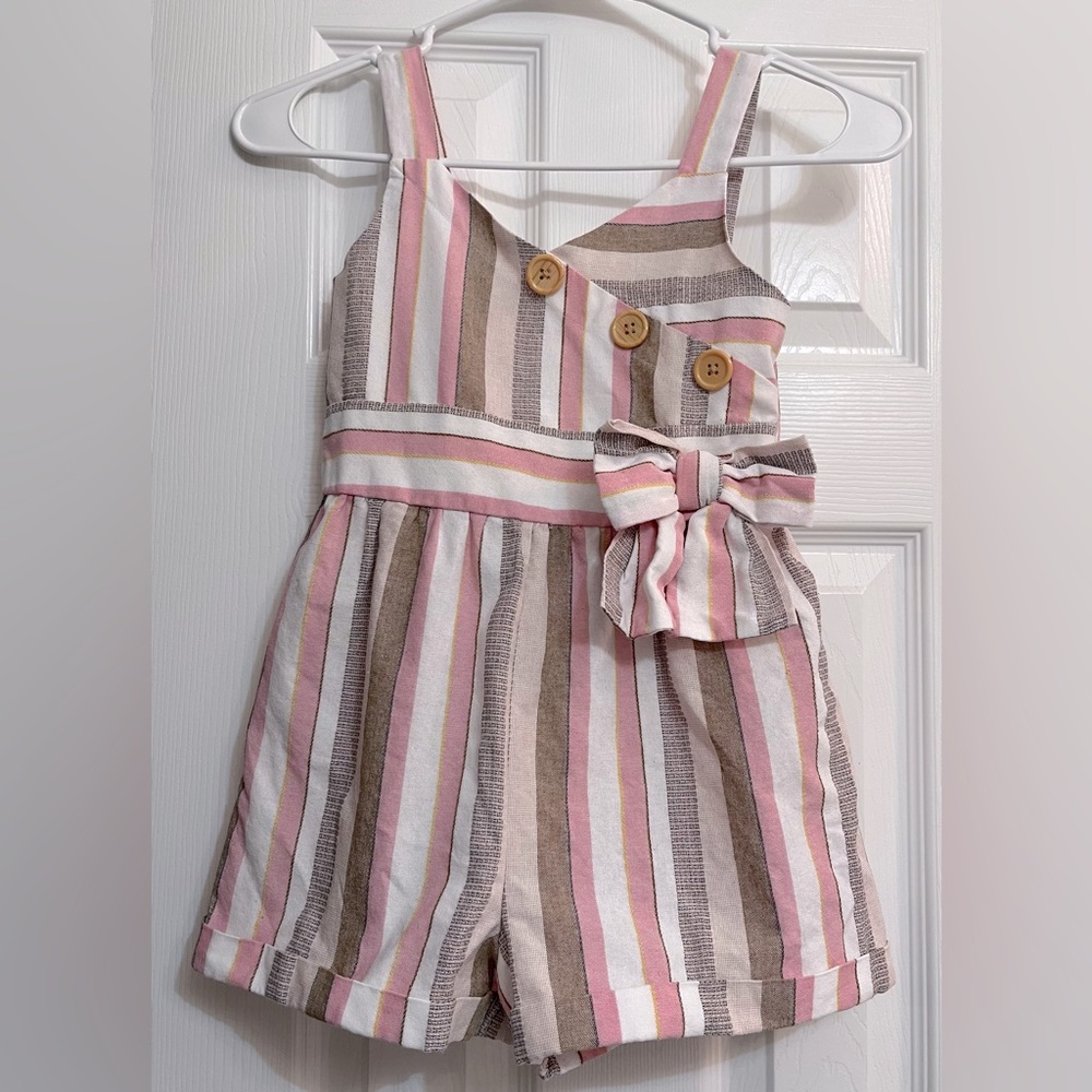 Girls size 8 romper. From local boutique. Fits more like a 6/7 than an 8.